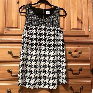 Dress up your favorite jeans or pair with black pants